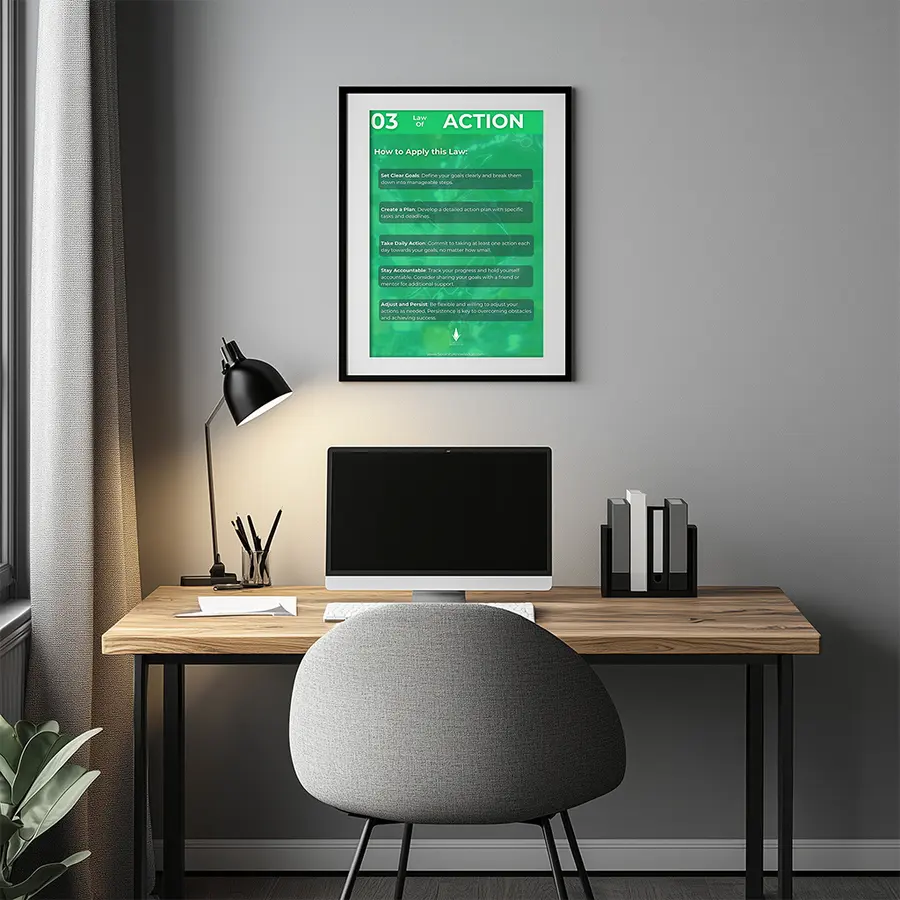 Law of Action reminder framed above a workspace