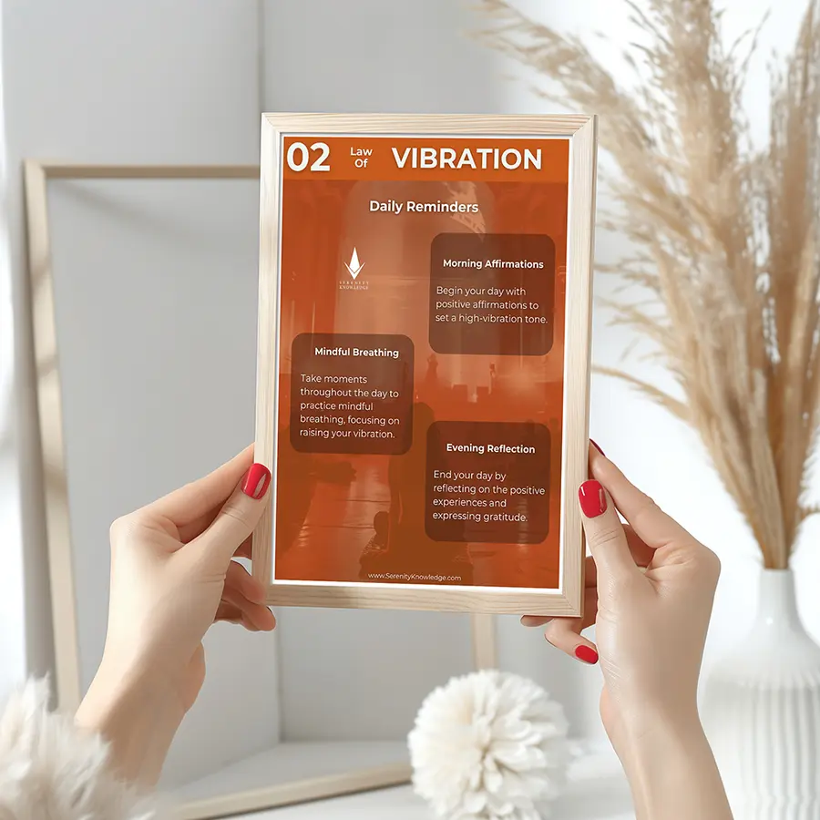Law of Vibration daily reminder held in a frame